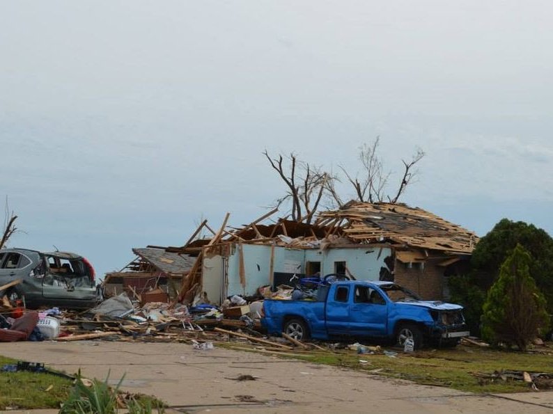 Residence with roof and walls destroyed by a tornado